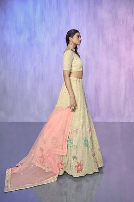 white heavy work lehenga with vibrant blouse and contrast matching dupatta 2