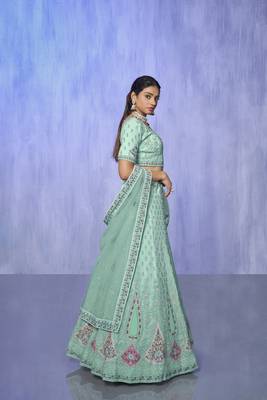 blue heavy work lehenga with vibrant blouse and contrast dupatta 2