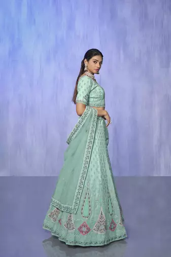 blue heavy work lehenga with vibrant blouse and contrast dupatta