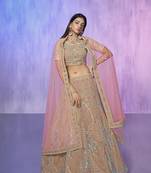 mauve heavy work lehenga with vibrant blouse and contrast dupatta