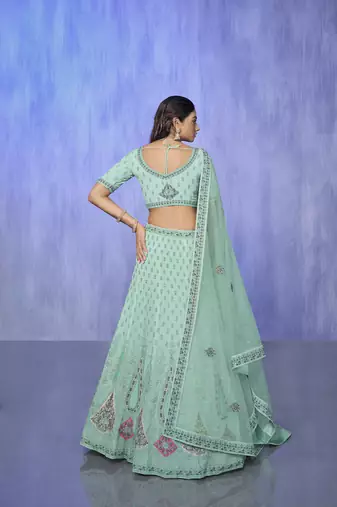 blue heavy work lehenga with vibrant blouse and contrast dupatta