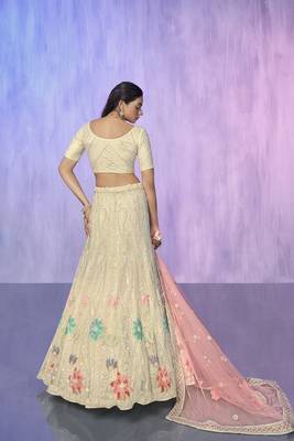 white heavy work lehenga with vibrant blouse and contrast matching dupatta 3