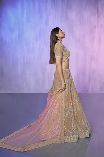 mauve heavy work lehenga with vibrant blouse and contrast dupatta
