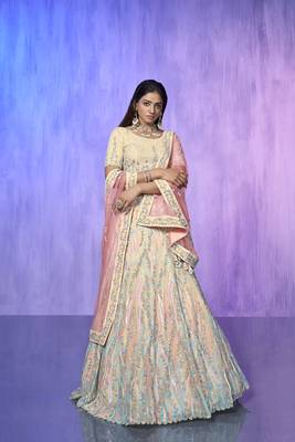white heavy work lehenga with vibrant blouse and contrast dupatta 1