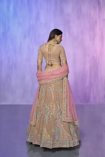 mauve heavy work lehenga with vibrant blouse and contrast dupatta