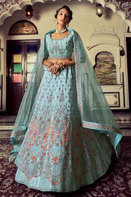 Aqua color heavy embroidered lehenga choli set. 5