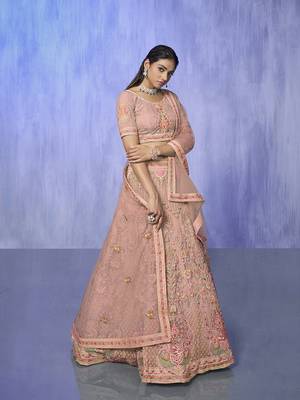peach heavy work lehenga with vibrant blouse and matching dupatta 5