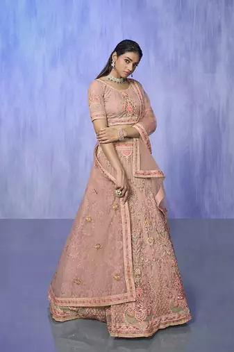 peach heavy work lehenga with vibrant blouse and matching dupatta
