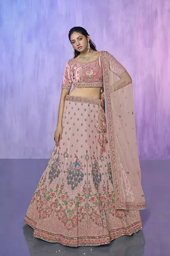 peach heavy work lehenga with vibrant blouse and contrast dupatta