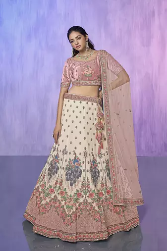 white heavy work lehenga with vibrant blouse and contrast dupatta