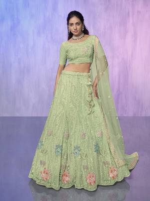 green heavy work lehenga with vibrant blouse and contrast dupatta 5