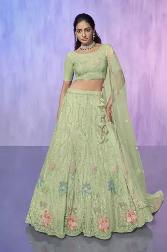 green heavy work lehenga with vibrant blouse and contrast dupatta