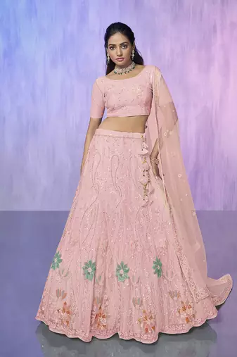 peach heavy work lehenga with vibrant blouse and contrast dupatta