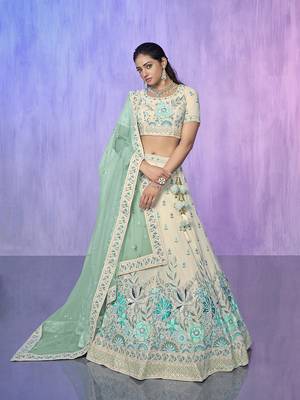 white heavy work lehenga with vibrant blouse and contrast dupatta 5