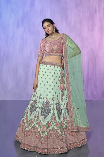 blue heavy work lehenga with vibrant blouse and contrast dupatta