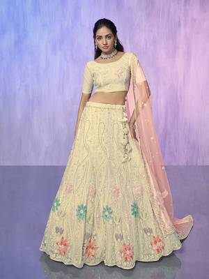 white heavy work lehenga with vibrant blouse and contrast matching dupatta 5