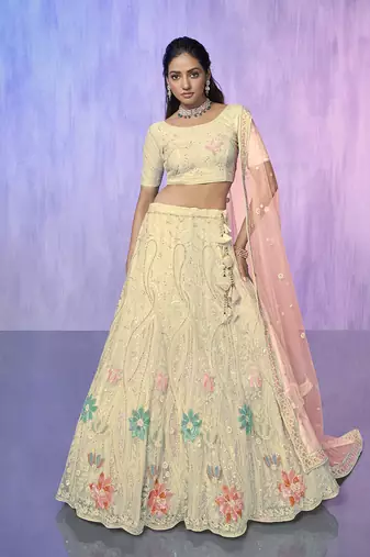 white heavy work lehenga with vibrant blouse and contrast matching dupatta