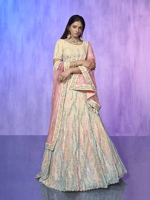 white heavy work lehenga with vibrant blouse and contrast dupatta 5