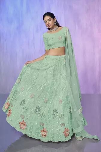 blue heavy work lehenga with vibrant blouse and contrast dupatta