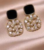 Pink enamel handpainted western pearl studded gold plated earring for women