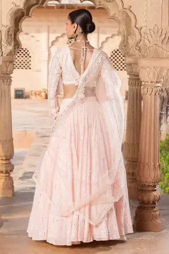 PEACH SEQUINE EMBROIDERY WORK SILK BLAND A LINE WEDDING WEAR LEHENGA CHOLI WITH DUPATTA.