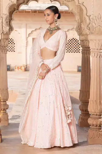 PEACH SEQUINE EMBROIDERY WORK SILK BLAND A LINE WEDDING WEAR LEHENGA CHOLI WITH DUPATTA.