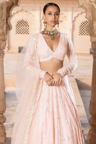 PEACH SEQUINE EMBROIDERY WORK SILK BLAND A LINE WEDDING WEAR LEHENGA CHOLI WITH DUPATTA.