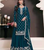 Peacock blue heavy embroidery dola silk semi stitched suits