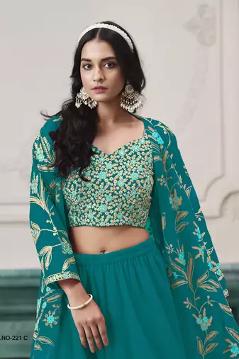 Turquoise fauk gerogette sequin embroidered stitched ethnic suit (free size)