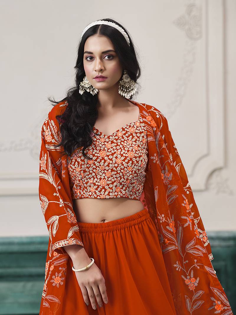Embroidered faux georgette orange readymade salwar kameez with shrug