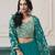 Embroidered faux georgette teal readymade salwar kameez with shrug