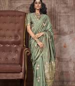 Sage green satin silk saree with brocade blouse