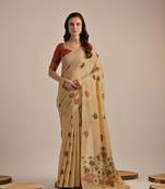 Beige multy floral weaving muga cotton saree