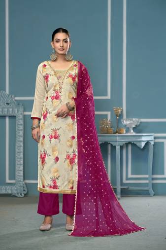Cream viscose banarasi fabric designer printed with embroidery and hand work heavy suit for girls