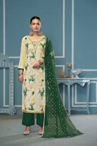 Cream viscose banarasi fabric designer printed with embroidery and hand work heavy suit for girls