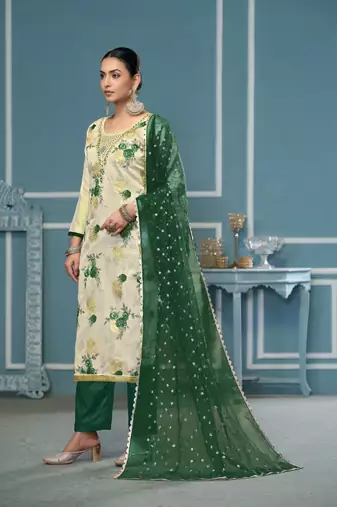 Cream viscosee banarasi fabric printed with embroidery and hand work heavy suit for girls
