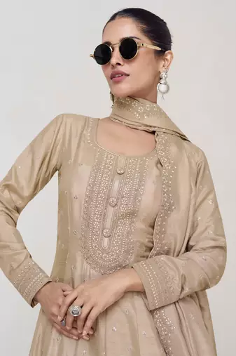 Beige embroidery, secquins silk gown - free size stitched(size upto 42")