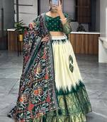 Off-White & Green Patola Printed Silk Traditional Lehenga Choli