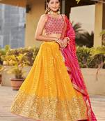Yellow Sequins Georgette Wedding Wear Lehenga Choli