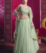 Light Pista Sequins Net Engagement Wear Lehenga Choli