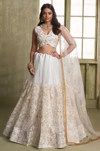 Off-White Embroidered Net Wedding Wear Lehenga Choli