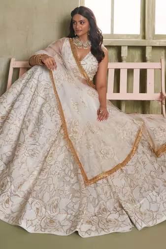 Off-White Embroidered Net Wedding Wear Lehenga Choli