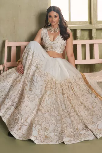 Off-White Embroidered Net Wedding Wear Lehenga Choli