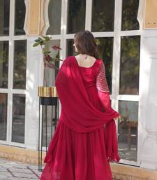 Pink georgette embroidered flared gown with dupatta