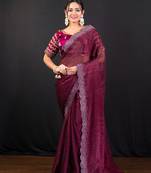 Wine jimmy choo saree with intricate silver embellishments and beautiful curve border