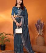 Tissue teal sequinned saree with blouse piece