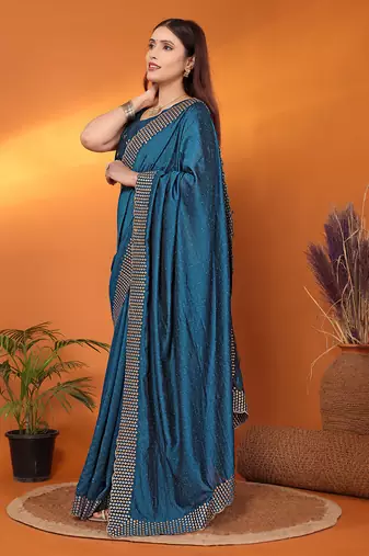 Silk blend teal embroidered saree with blouse piece