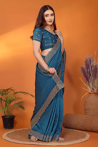 Silk blend teal embroidered saree with blouse piece