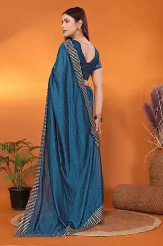 Silk blend teal embroidered saree with blouse piece
