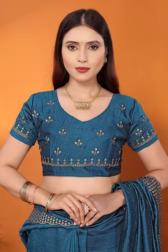 Silk blend teal embroidered saree with blouse piece